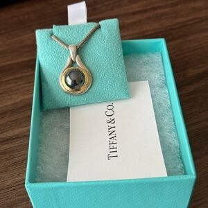 Tiffany & Co hematite pendant and 16.25” chain